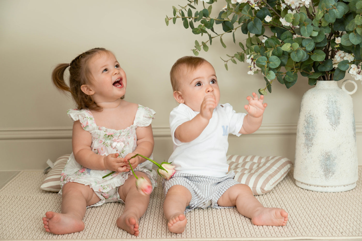 Discover the perfect addition to your little one's wardrobe with our boys white &amp; sage stripe short sleeve romper. Designed by Mintini Baby, this romper features a classic white and sage stripe design, perfect for the spring/summer season. Available in sizes 3-12 months, this romper will keep your baby looking stylish and comfortable.