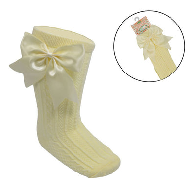 Lemon ribbed baby knee-length socks with large satin bow for girls aged 0–24 months