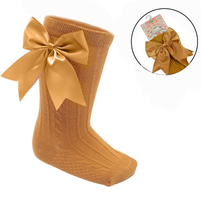 Mustard ribbed baby knee-length socks with large satin bow for girls aged 0–24 months
