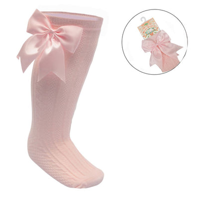 Baby pink ribbed baby knee-length socks with large satin bow for girls aged 0–24 months