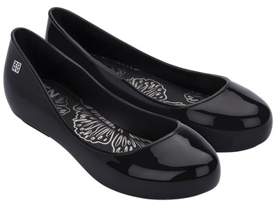 Pop Classic - in Plain Black - is a superbly sleek edition of the Zaxy Pop; a style which has consistently shown to be a hit in every season! This shoe keeps the strength in simplicity with an almond toe, and the cushioned footbed is decorated just for you!  Made in Brazil Comfortable to wear Generally true to size - if unsure, go up a size Made with Flexpand, which is 100% recyclable Vegan - no animal products used
