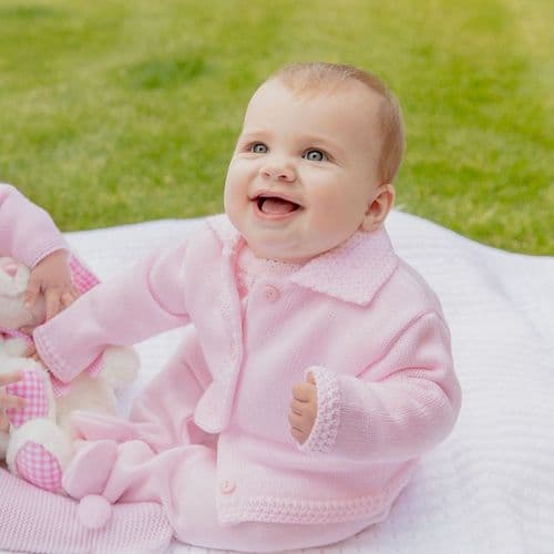 Introduce your little girl to the world of fashion with our Dandelion branded Pink Button Up Cardigan. With a stylish collar detail and easy button up closure, this cardigan is perfect for any occasion. Available in sizes newborn up to 12 months, your little one will be the cutest fashionista in town.