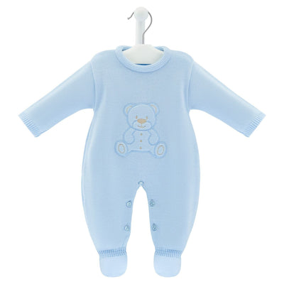 Blue teddy bear knitted onesie, perfect for a baby boy. This outfit has a cute knitted bear applique on the front and a 2 button opening on the neck. Available in sizes newborn, 0-3 months, 3-6 months & 6-9 months.  100% Acrylic