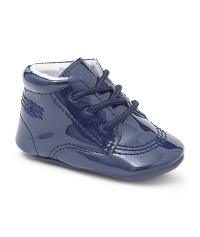 These baby boys navy blue lace up soft sole pram shoes are the perfect blend of style and comfort for your little one. With a soft fur lining on the inside and a comfortable sole, these Sevva branded shoes will keep your baby's feet cosy all day long. Available in various colours and sizes, these pram shoes are an essential addition to your baby's wardrobe.