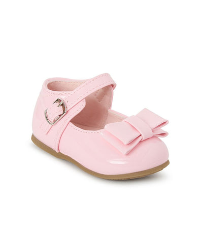 These Sevva branded girls shoes are the perfect addition to your little one's wardrobe. The sleek pink patent design is both stylish and durable, with a hard sole for added protection. The charming bow detail and buckle fastening add a touch of elegance to these must-have shoes.