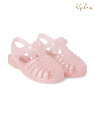 These glittery pink sandals for baby girls are an ideal choice for summer. With a classic design, they offer both fashion and comfort. Ranging in sizes 6 to 11, these shoes add a subtle sparkle to any ensemble. Perfect for aspiring young fashionistas.