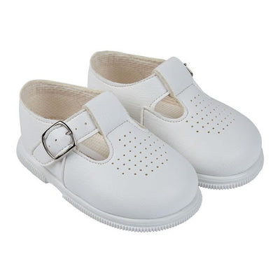 White faux leather 'Baypods' first walker shoes. Made in England, these smart, traditionally styled shoes are the perfect choice for babies and toddlers. They have buckle fastening straps to keep securely on little feet and rounded shaped toes for correct foot development. . Faux leather uppers Textile lining Wipe clean Buckle strap Shoes suitable for girls and boys