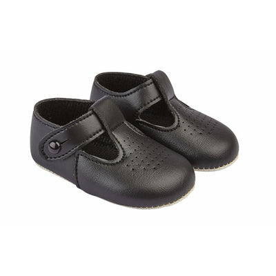 These black pre-walker baby shoes, from our Baypods collection, are beautifully made in soft faux leather and have a dainty holed pattern on the toes. In a t-bar style, they are easy to put on and secure with a button fastening strap. They have a lightly cushioned insole and their flexible soles are just right for developing feet.  Faux leather Lightly cushioned insole  Flexible soles Button fastening strap Shoes suitable for boys & girls