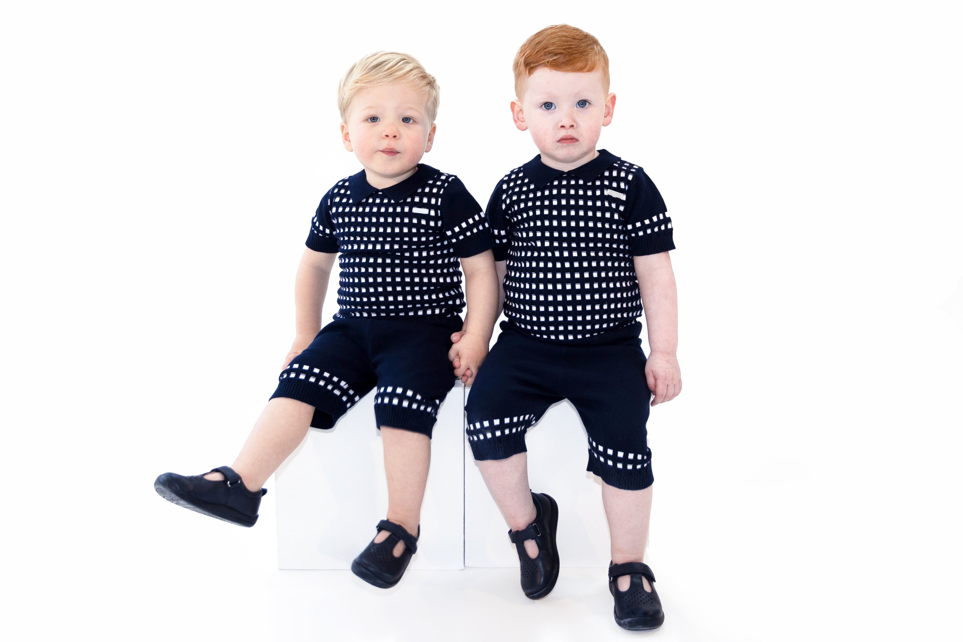 Kidz Emporium boutique babywear archive clearout fifteen pounds deal - illustrative lifestyle example of heritage Spanish style knitwear