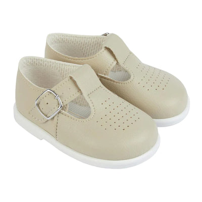 Biscuit faux leather 'Baypods' first walker shoes. Made in England, these smart, traditionally styled shoes are the perfect choice for babies and toddlers. They have buckle fastening straps to keep securely on little feet and rounded shaped toes for correct foot development. . Faux leather uppers Textile lining Wipe clean Buckle strap Shoes suitable for girls and boys