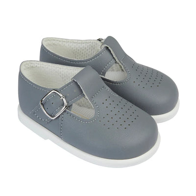 Grey faux leather 'Baypods' first walker shoes. Made in England, these smart, traditionally styled shoes are the perfect choice for babies and toddlers. They have buckle fastening straps to keep securely on little feet and rounded shaped toes for correct foot development. Faux leather uppers Textile lining Wipe clean Buckle strap Shoes suitable for girls and boys