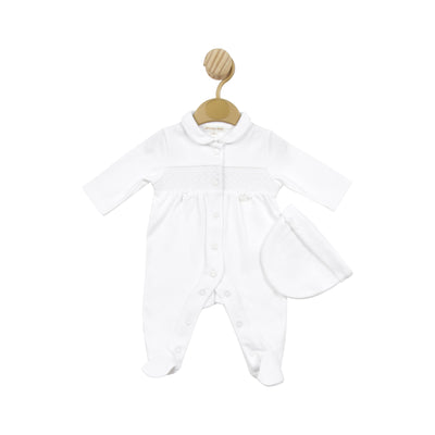 This white all-in-one sleep suit and hat set is perfect for premature babies, designed by baby boutique brand Mintini Baby. The smocked detail across the middle adds a beautiful touch. Available in sizes 3/5lb, 5/8lb, and newborn.