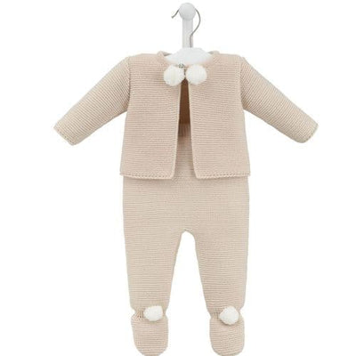 This set from baby clothing brand Dandelion features a beige two piece knitted set with pom pom detail. The set includes a jacket with front fastening adorned with charming pom poms and trousers to match. Perfect for any occasion, this cosy set is designed in the UK and made in Portugal from easy care acrylic material. Choose from five colours - Blue, Pink, White, Grey, and Beige - and a variety of sizes including Newborn, 0-3 months, 3-6 months, and 6-12 months.