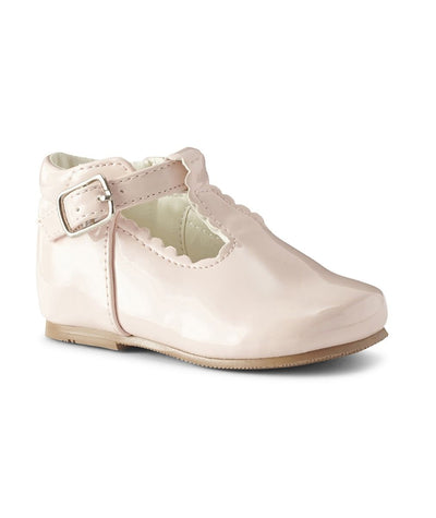 Enhance your little one's style with these girls classic T-Bar shoes, featuring a glossy pink patent finish. The ankle support provides extra stability and the buckle side fastening ensures a secure fit. Available in sizes 2 through 6 and four colour options: White, Pink, Grey, and Red.